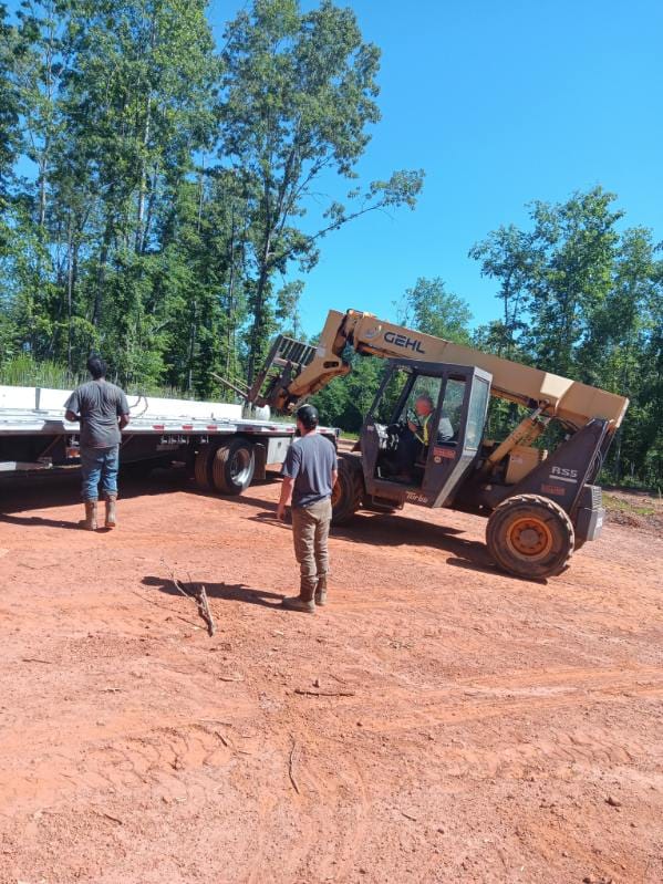 Telehandler offloading OWS Tank accessories