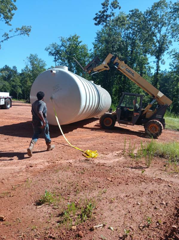 Telehandler carrying OWS Tank